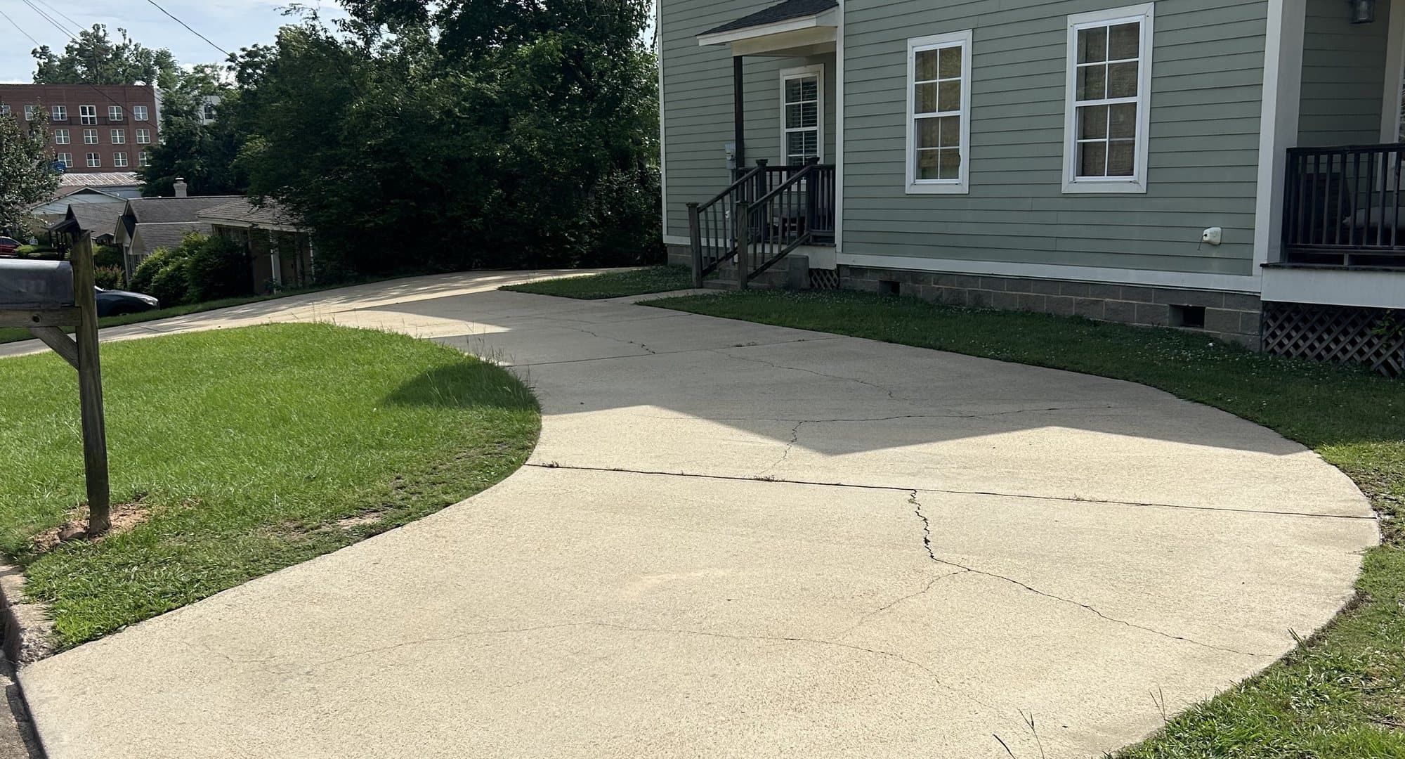 A freshly pressure-washed driveway and home in Oxford, Mississippi